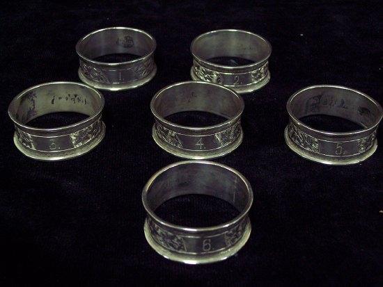 Appraisal: A set of six napkin rings numbered - Birmingham