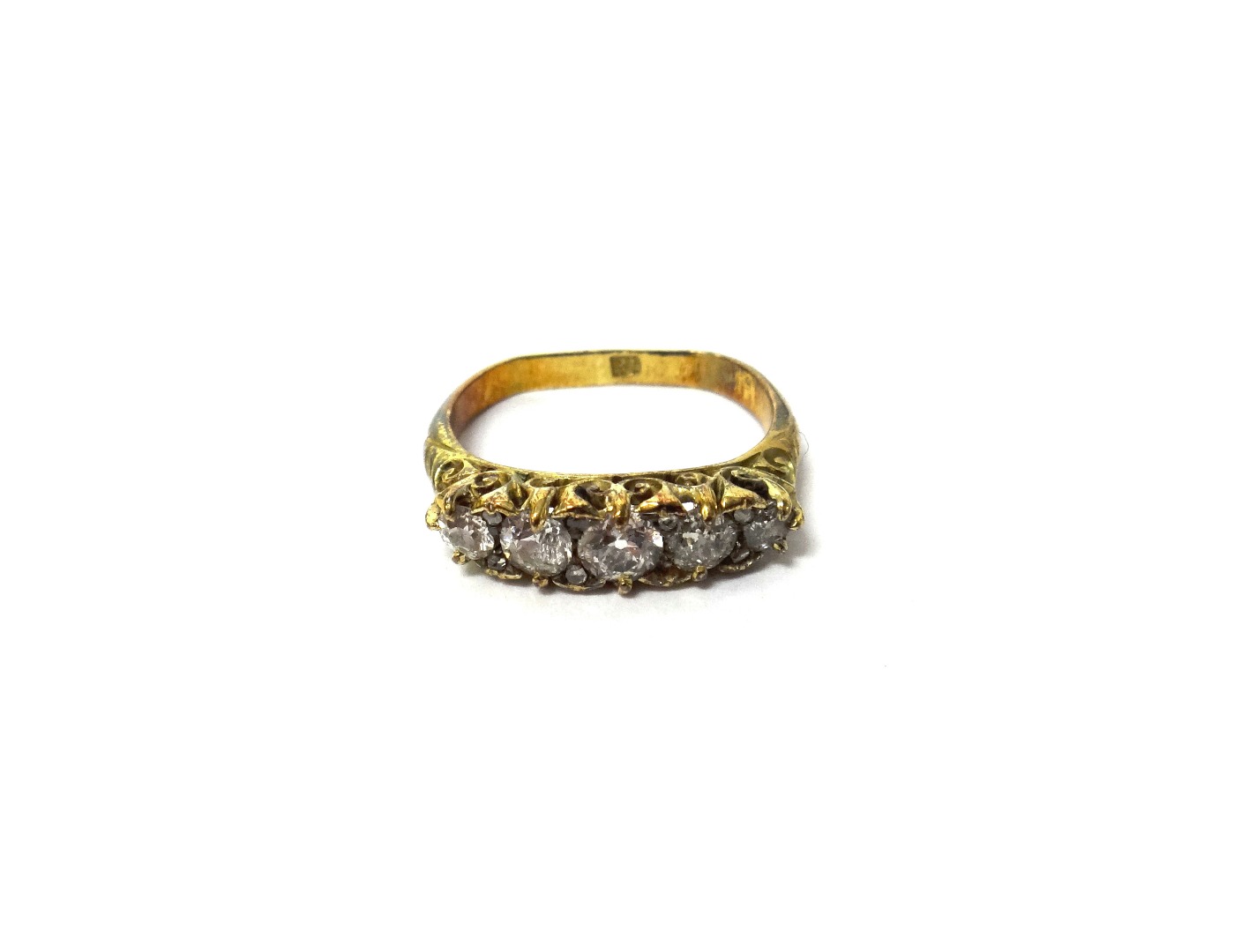 Appraisal: A gold and diamond set five stone ring mounted with