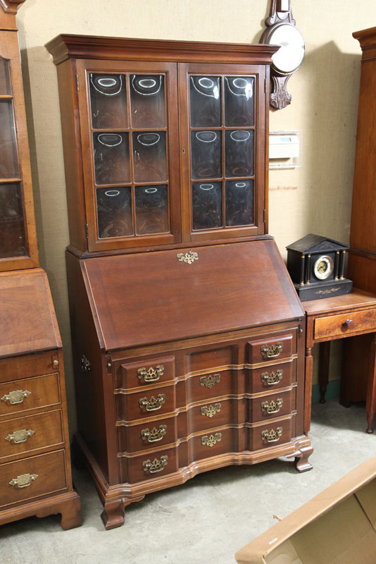 Appraisal: MADDOX SECRETARY BOOKCASE Walnut with glazed and paneled upper door