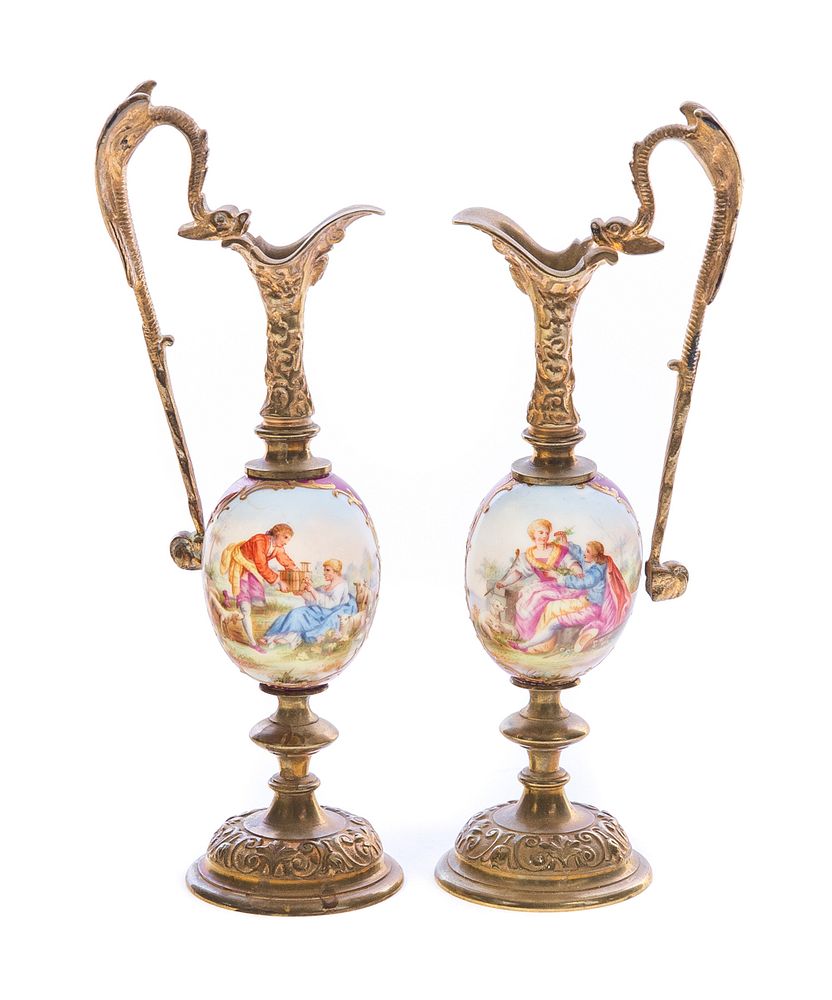 Appraisal: Pair French Bronze Porcelain Ewers with courting scenes Pair French