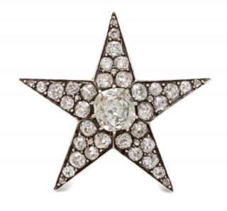 Appraisal: A Victorian Silver Topped Gold and Diamond Star Brooch dwts