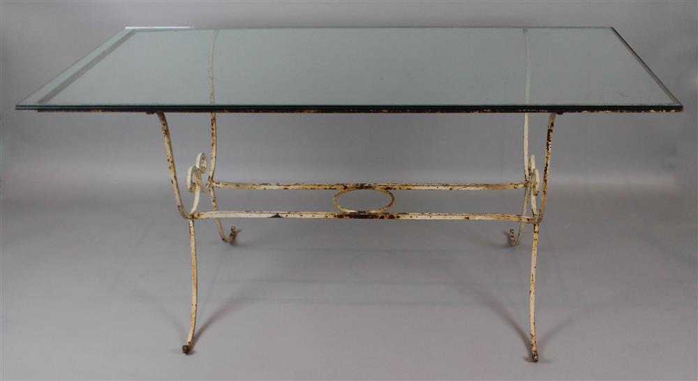 Appraisal: RUSTIC RECTANGULAR GLASS TOPPED WROUGHT IRON TABLE having remnants of