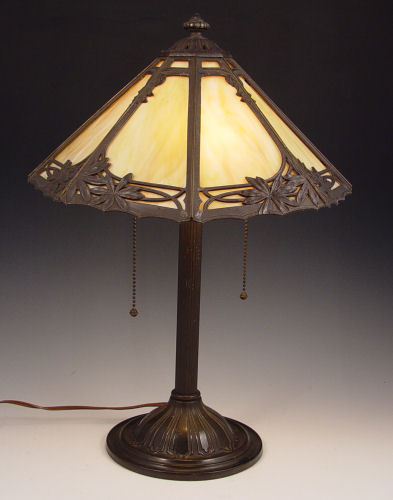 Appraisal: BRADLEY HUBBARD TABLE LAMP Conical shade of caramel slag glass