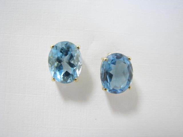 Appraisal: A pair of K yellow gold blue topaz earrings basket