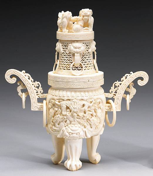 Appraisal: Ivory Carvings The censer supported on three claw-and-ball-feet decorated to