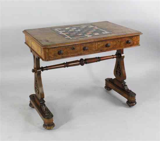 Appraisal: A Victorian walnut games table by James Winter Son with