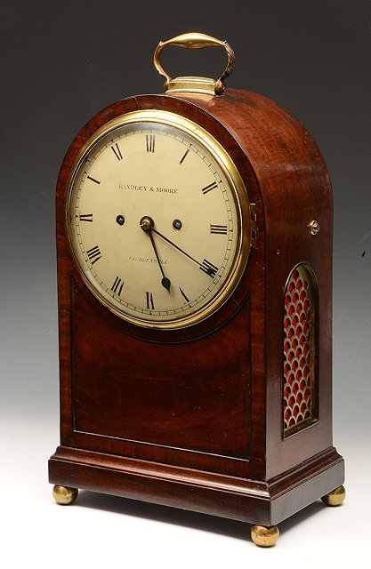 Appraisal: A REGENCY MAHOGANY MANTEL OR TABLE CLOCK the white Roman