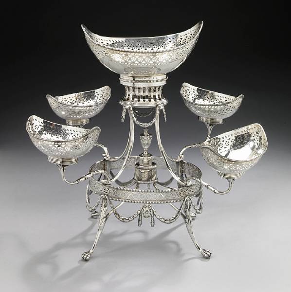 Appraisal: A George III silver four-arm five-basket epergneRobert Hennell London With