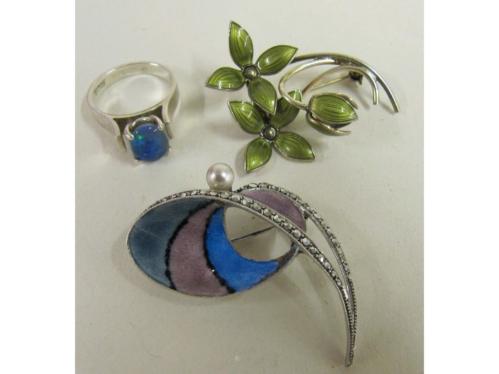 Appraisal: Lot comprising two silver and enamel brooches a silver opal