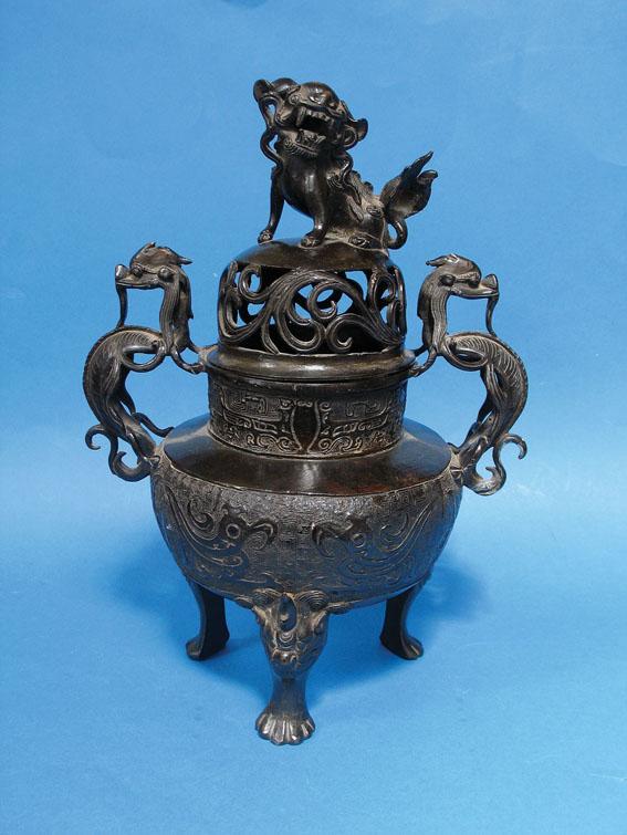 Appraisal: A CHINESE BRONZE INCENSE BURNER AND COVER with archaistic style