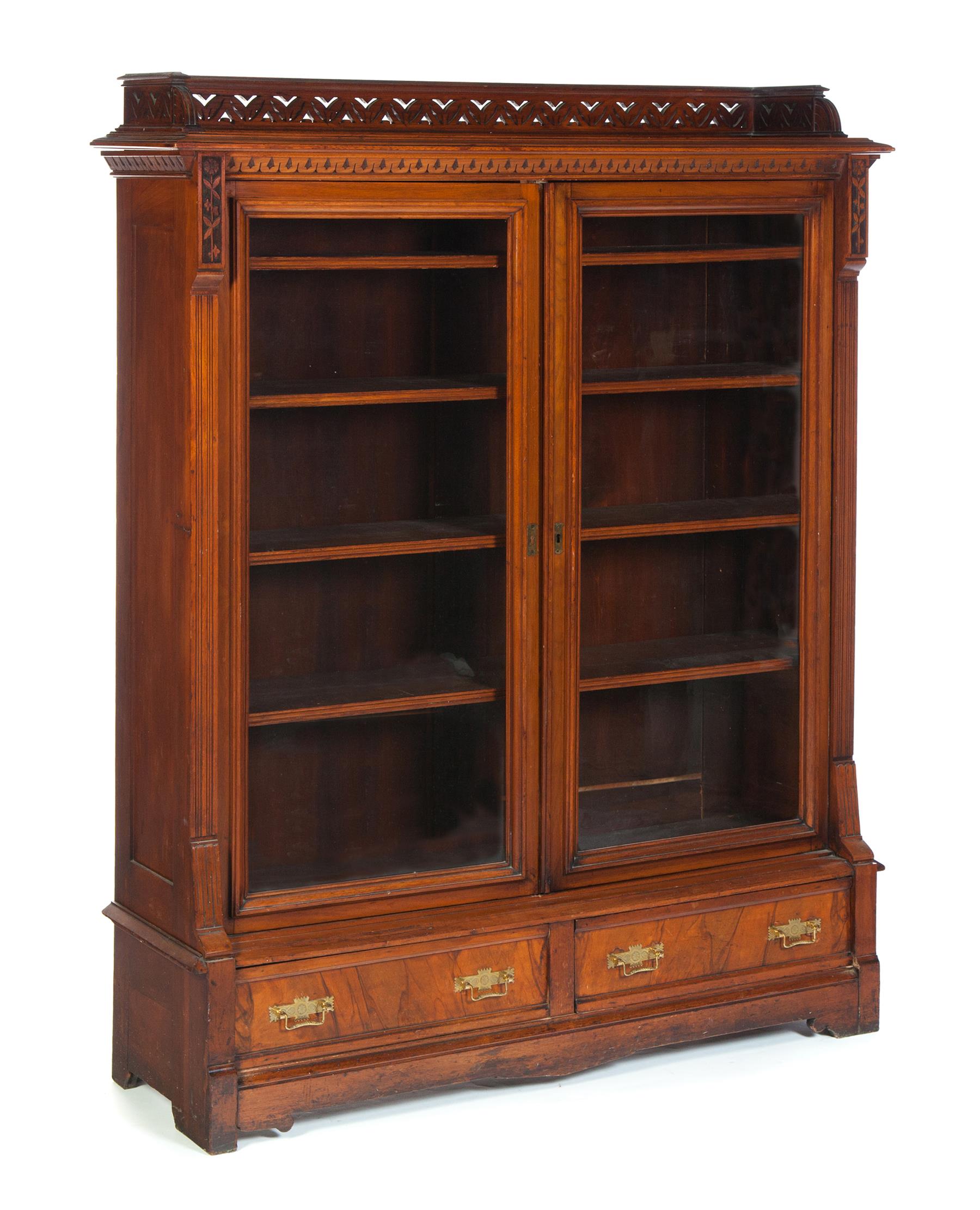 Appraisal: LATE-VICTORIAN TWO-DOOR LIBRARY BOOKCASE American th quarter- th century walnut