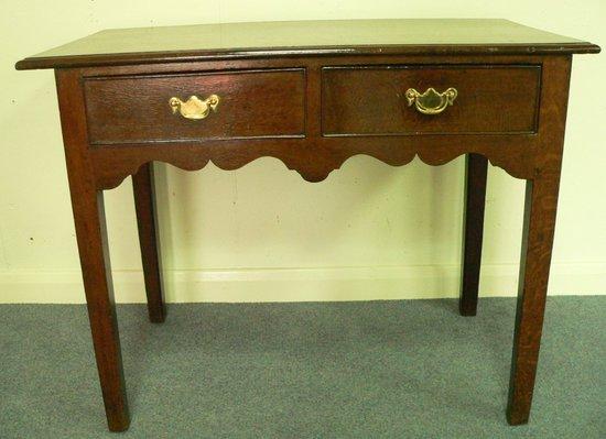 Appraisal: An early th Century oak table the rectangular top with