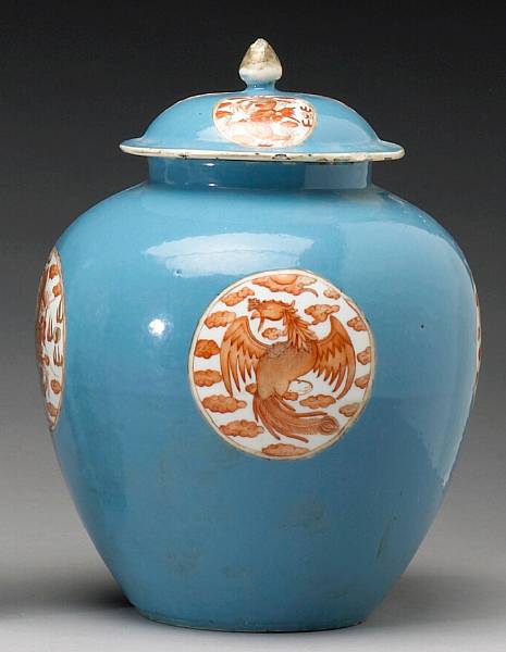 Appraisal: A blue-grey ground and iron red enameled porcelain covered jar