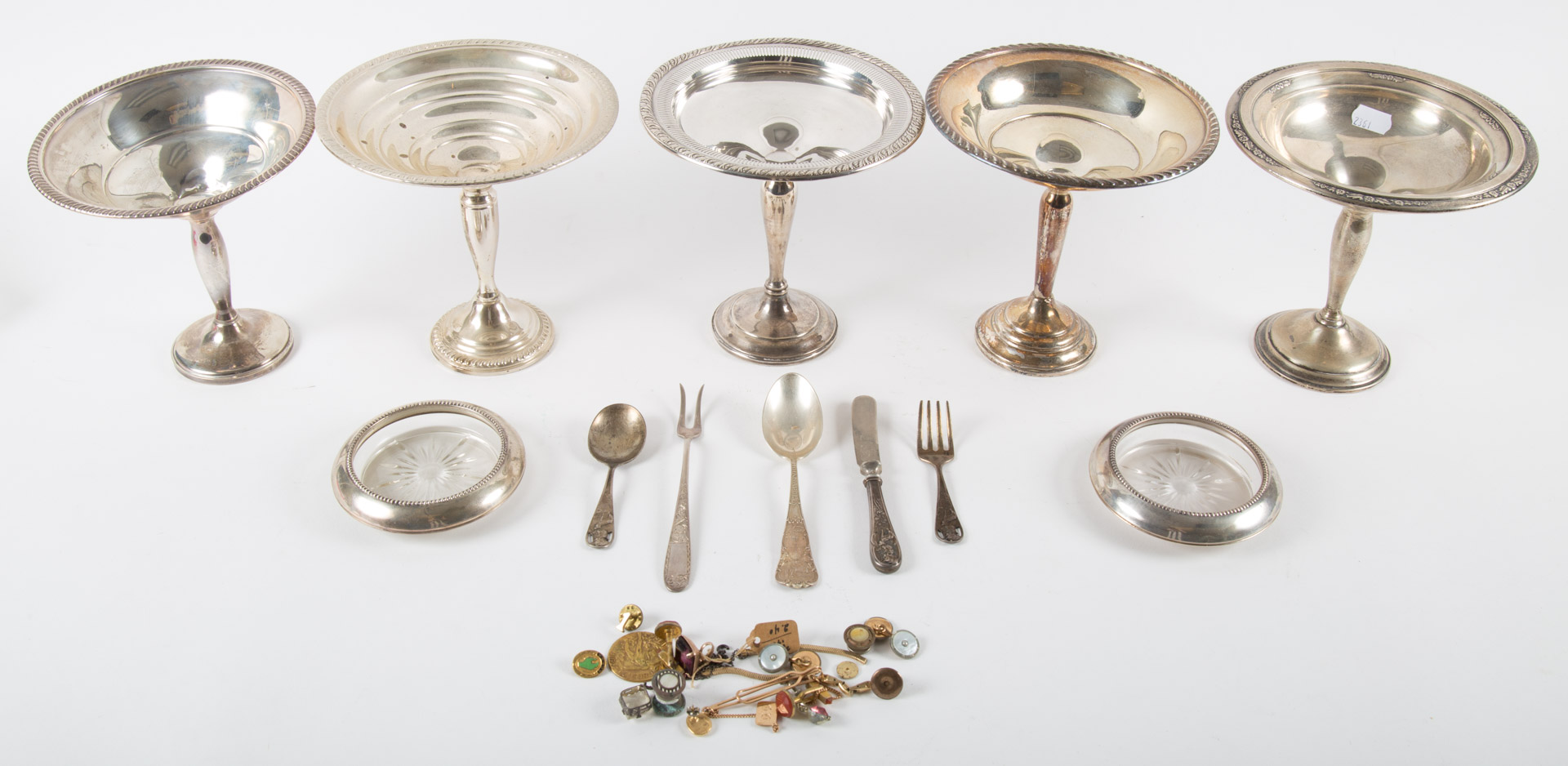 Appraisal: Assorted items including five sterling weighted compotes five sterling utensils