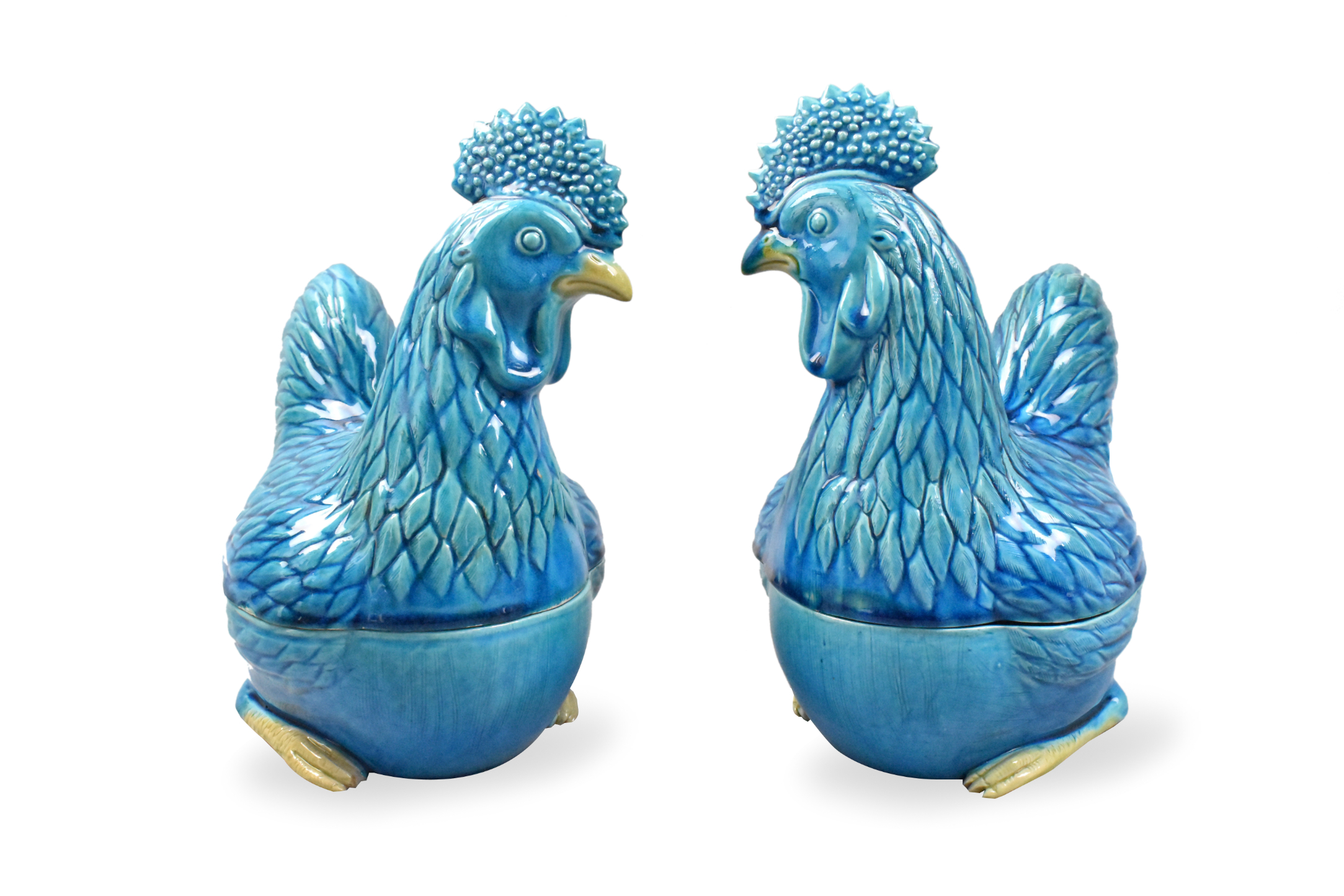 Appraisal: A pair of peacock glazed rooster covered boxes dated from