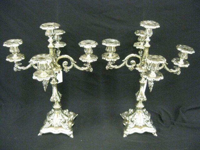 Appraisal: Pair of Victorian Silverplate Candelabra European fancy figural arms faces