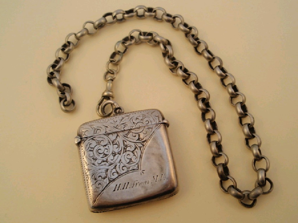 Appraisal: An Edwardian silver vesta case Birmingham together with a white