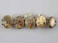 Appraisal: A mother of pearl bracelet comprising oval hand painted discs