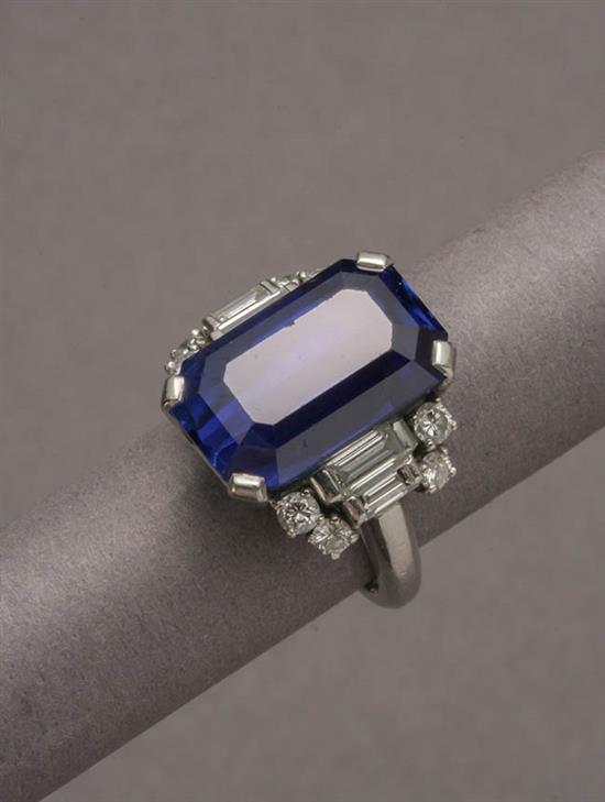 Appraisal: Platinum Blue Sapphire and Diamond Ring The four-prong mount set