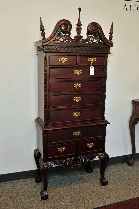 Appraisal: DIMINUTIVE TWO PIECE HIGHBOY Mahogany having an openwork crest carved