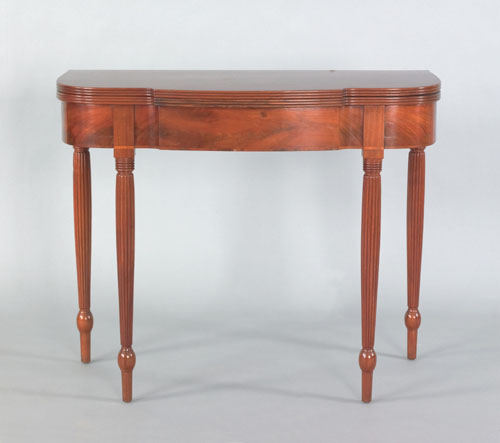 Appraisal: Philadelphia Sheraton mahogany card table ca with a demilune folding