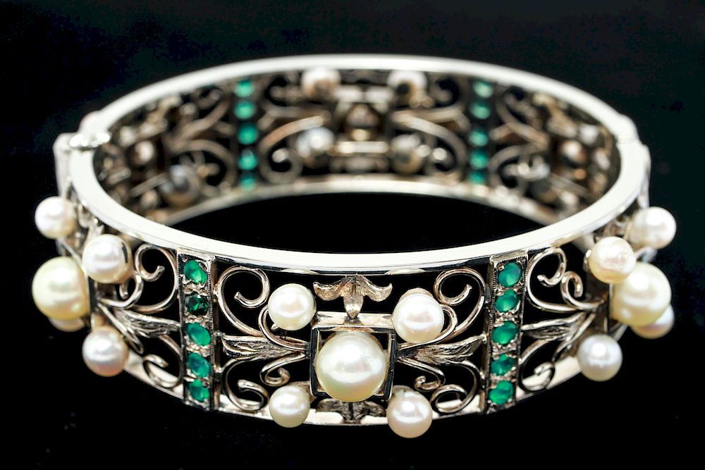 Appraisal: K Gold Emeralds Pearls Hinged Bracelet K white gold emeralds