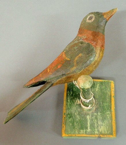 Appraisal: Folk Art carved bird with old paint decoration h x