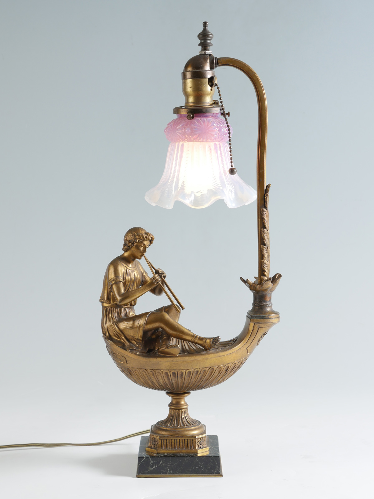 Appraisal: PAN BRONZE LAMP WITH OPALESCENT SHADE French bronze lamp having