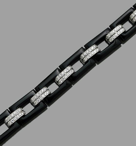 Appraisal: A black onyx and diamond bracelet estimated total diamond weight