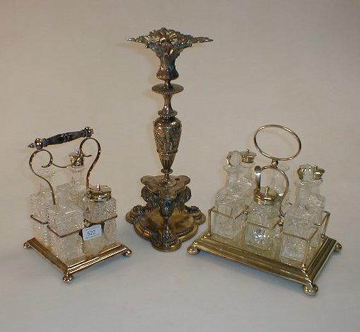 Appraisal: Two cruet stands with EPNS frames and a Elkington centre