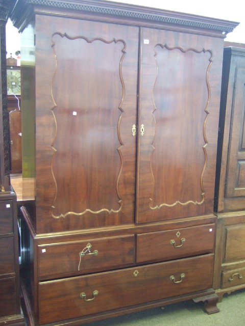 Appraisal: A th century linen press the double dentil cornice over