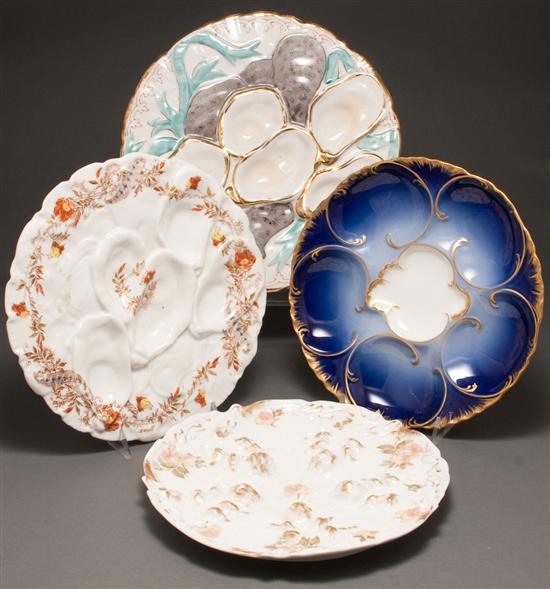 Appraisal: Three Limoges porcelain oyster plates and an Austrian oyster plate