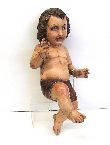 Appraisal: A Spanish colonial style painted and carved wood figure of