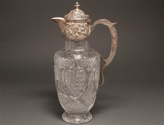 Appraisal: English repousse silver-mounted cut glass claret jug bearing hallmarks of