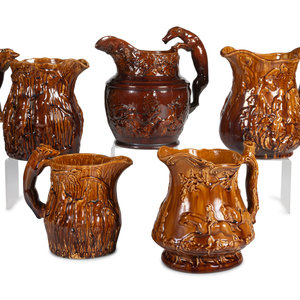 Appraisal: Five Rockingham Glaze Water Pitchers th Century Height of largest