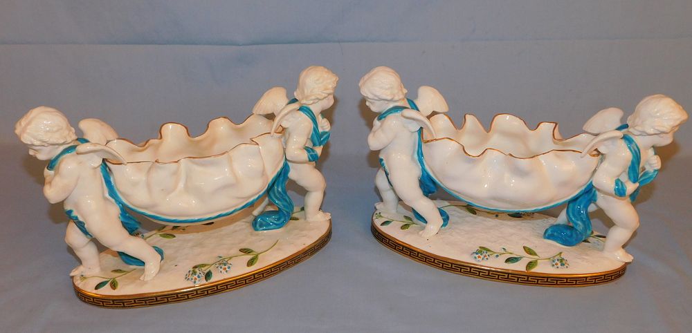 Appraisal: PAIR ANTIQUE PORCELAIN CHERUB BOWLS Pair of antique glazed white