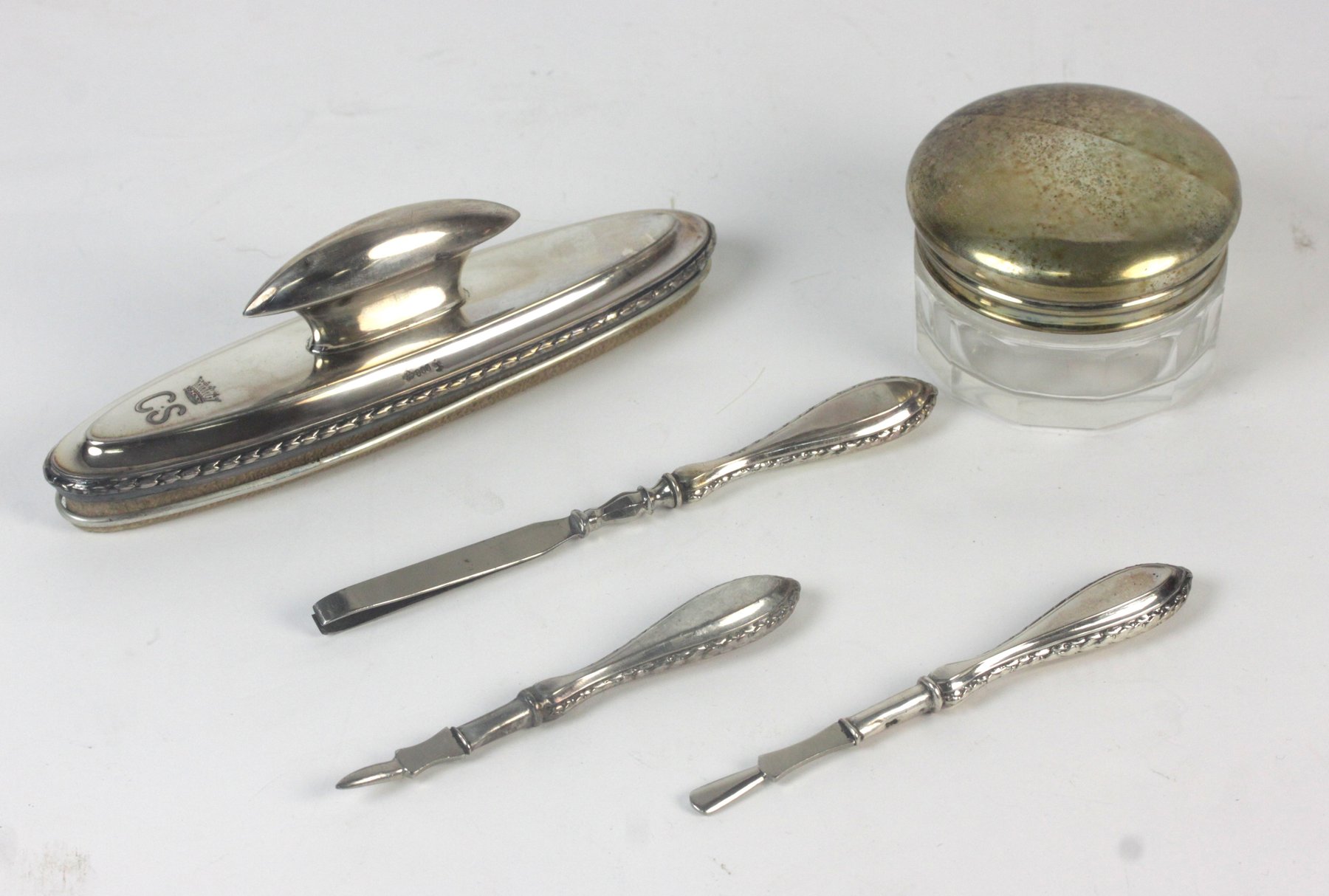 Appraisal: An standard manicure buffer three other pieces and a jar