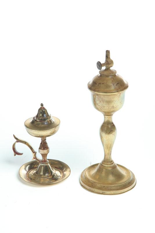 Appraisal: TWO BRASS LAMPS Probably European th century Tall with baluster