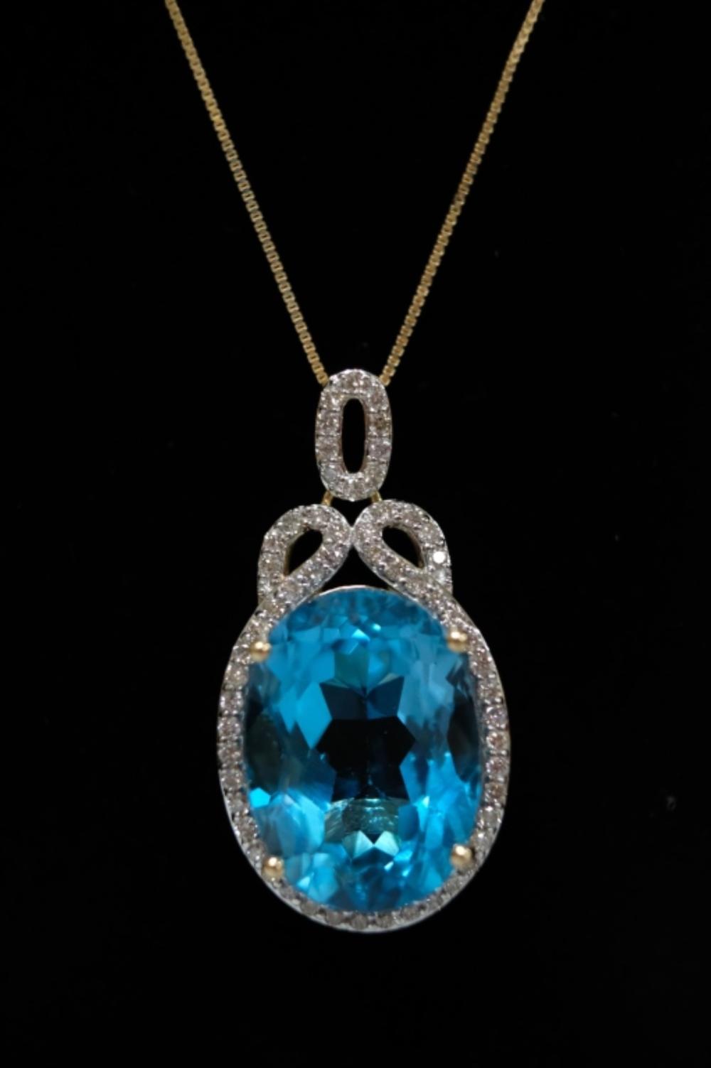 Appraisal: CT TOPAZ DIAMOND PENDANT Carat oval cut blue topaz pendant