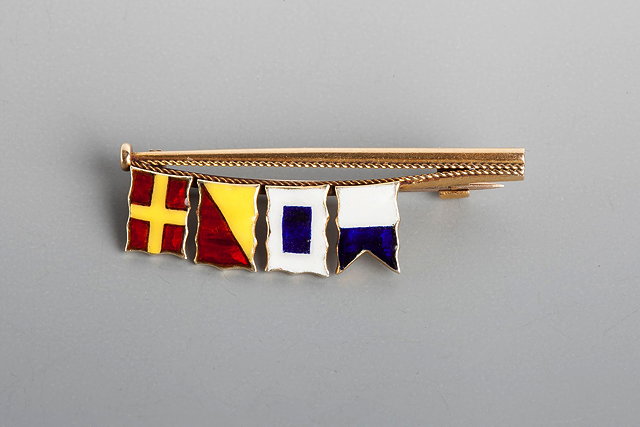 Appraisal: A GOLD AND ENAMEL NAVAL FLAG BROOCH in ct gold