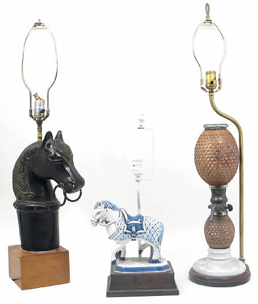 Appraisal: An assembled group of four table lamps Comprising a seltzer