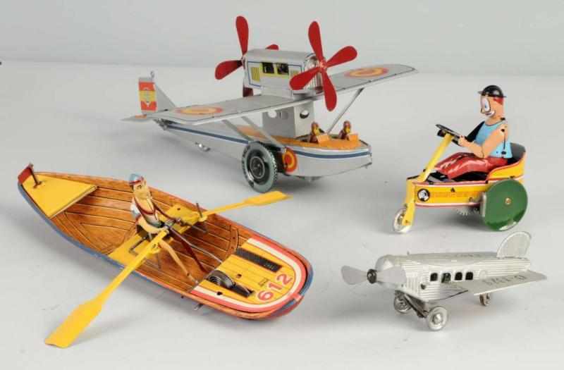 Appraisal: Lot of Contemporary Paya Toys Description Includes sea plane rowing