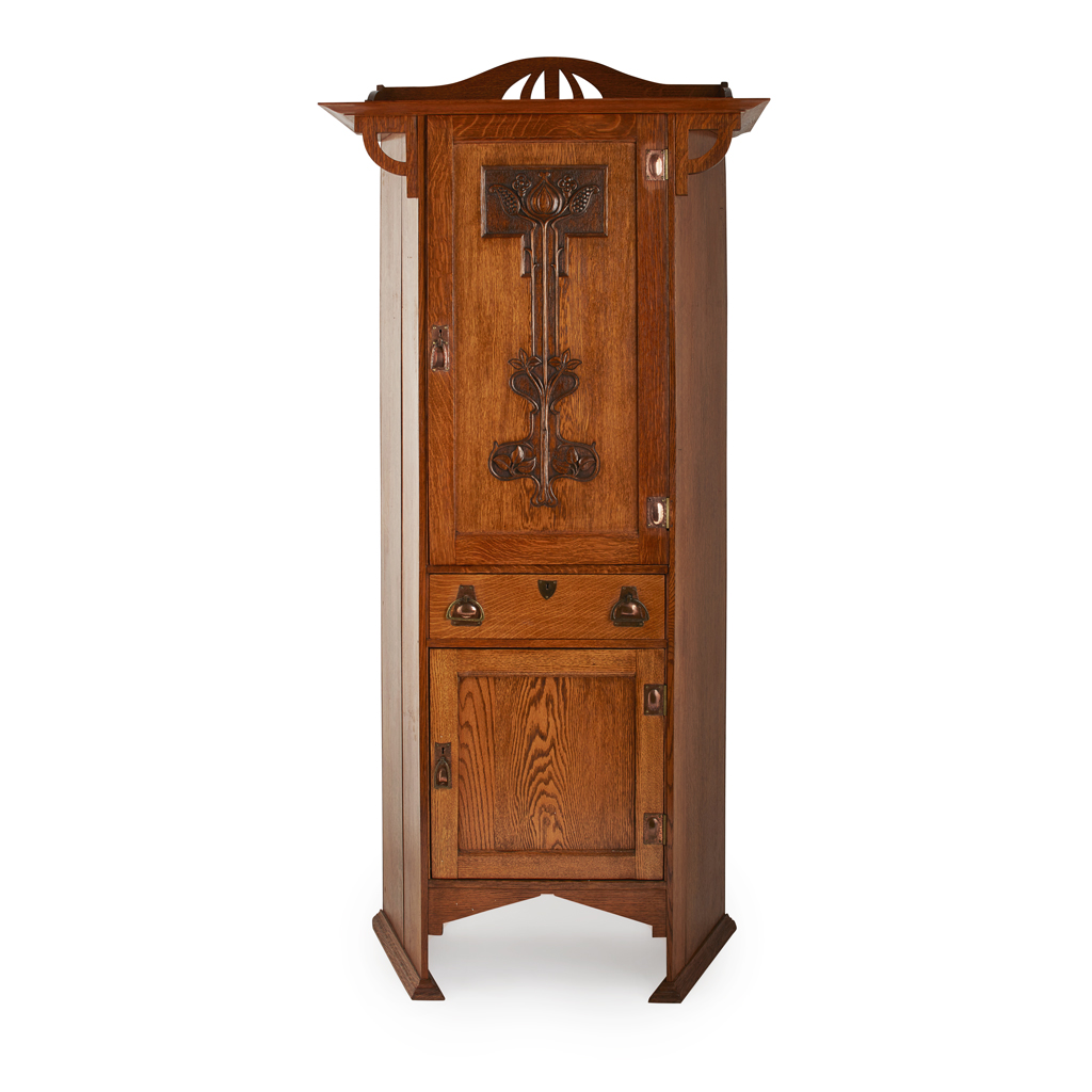 Appraisal: SHAPLAND PETTER BARNSTAPLE OAK SMOKERS CABINET CIRCA the pierced surmount