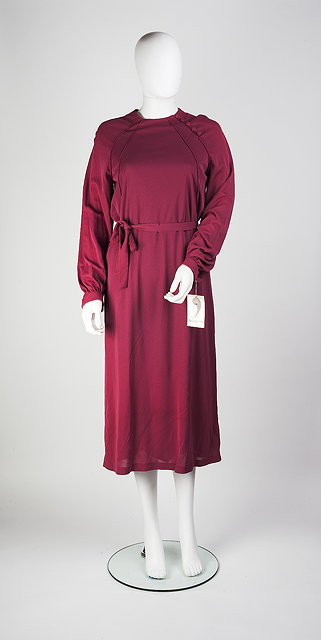 Appraisal: A pink Apostrophe dress with full length cuffed sleeves and