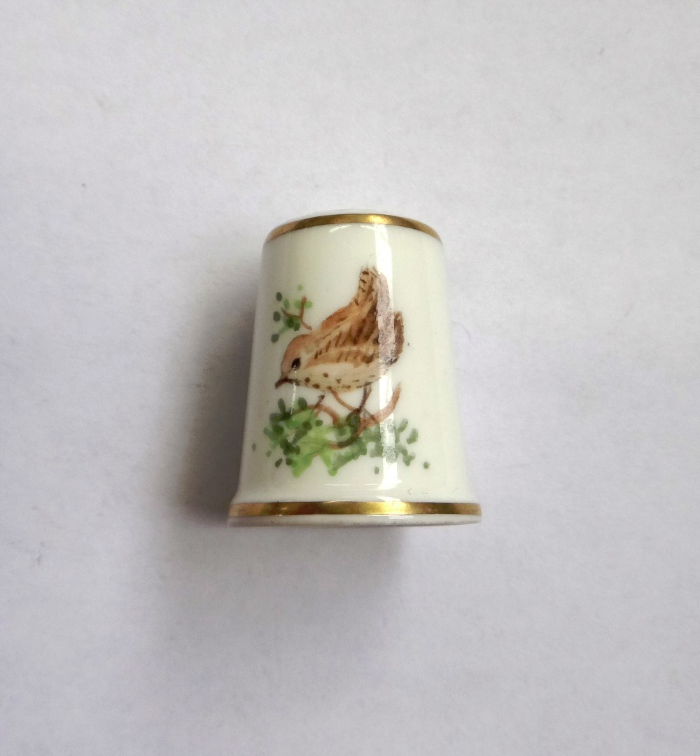 Appraisal: A Royal Worcester black printed factory mark porcelain thimble with