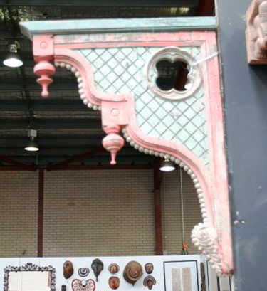 Appraisal: A pair of wooden carved and painted architectural details balcony