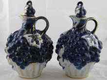 Appraisal: A pair of Soviet Russian Lomonosov jugs with stoppers modelled