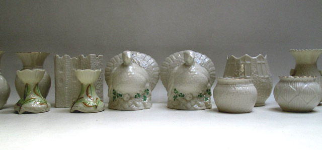 Appraisal: FIFTEEN BELLEEK VASES AND SPILLS various patterns and sizes Thistle