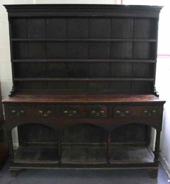 Appraisal: A late th Century pine dresser with shelves over the