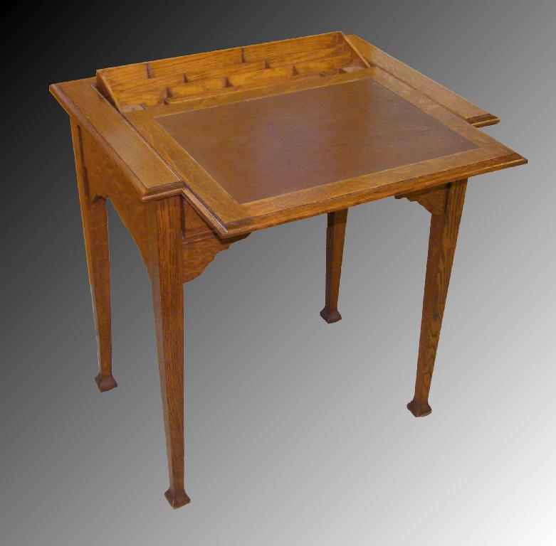 Appraisal: Oak Arts Crafts writing desk the sliding inset top opening